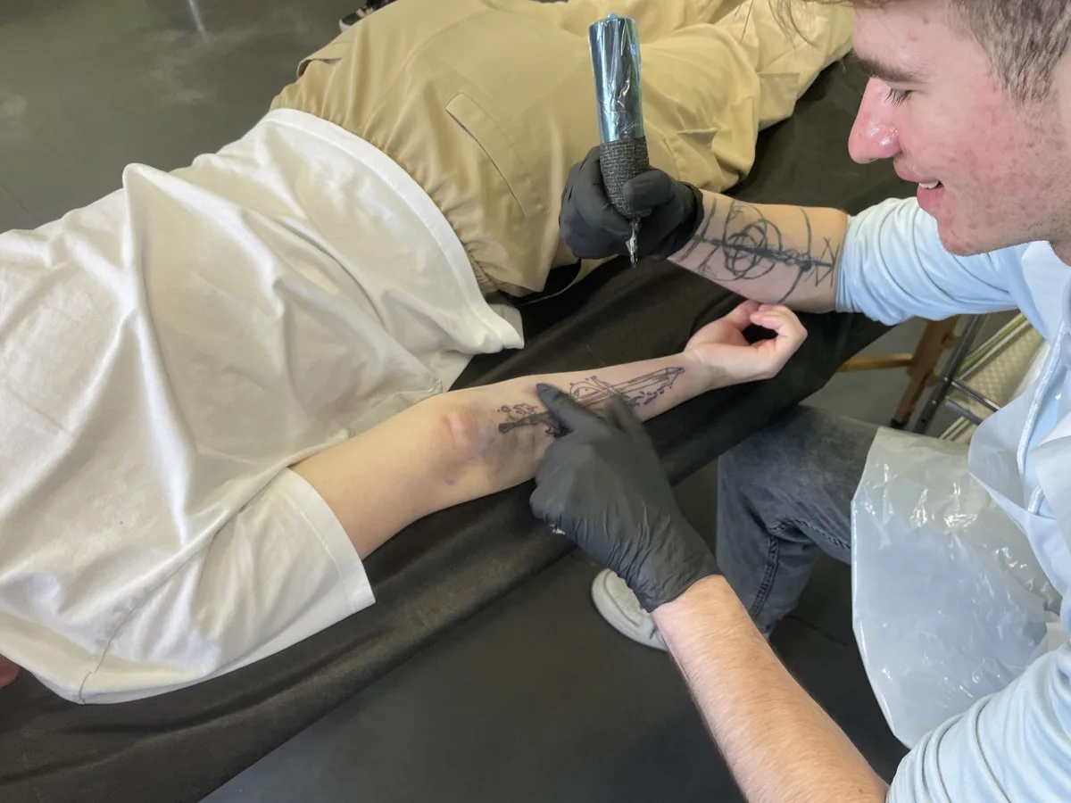 New fine-line artists learning to tattoo at London Tattoo College