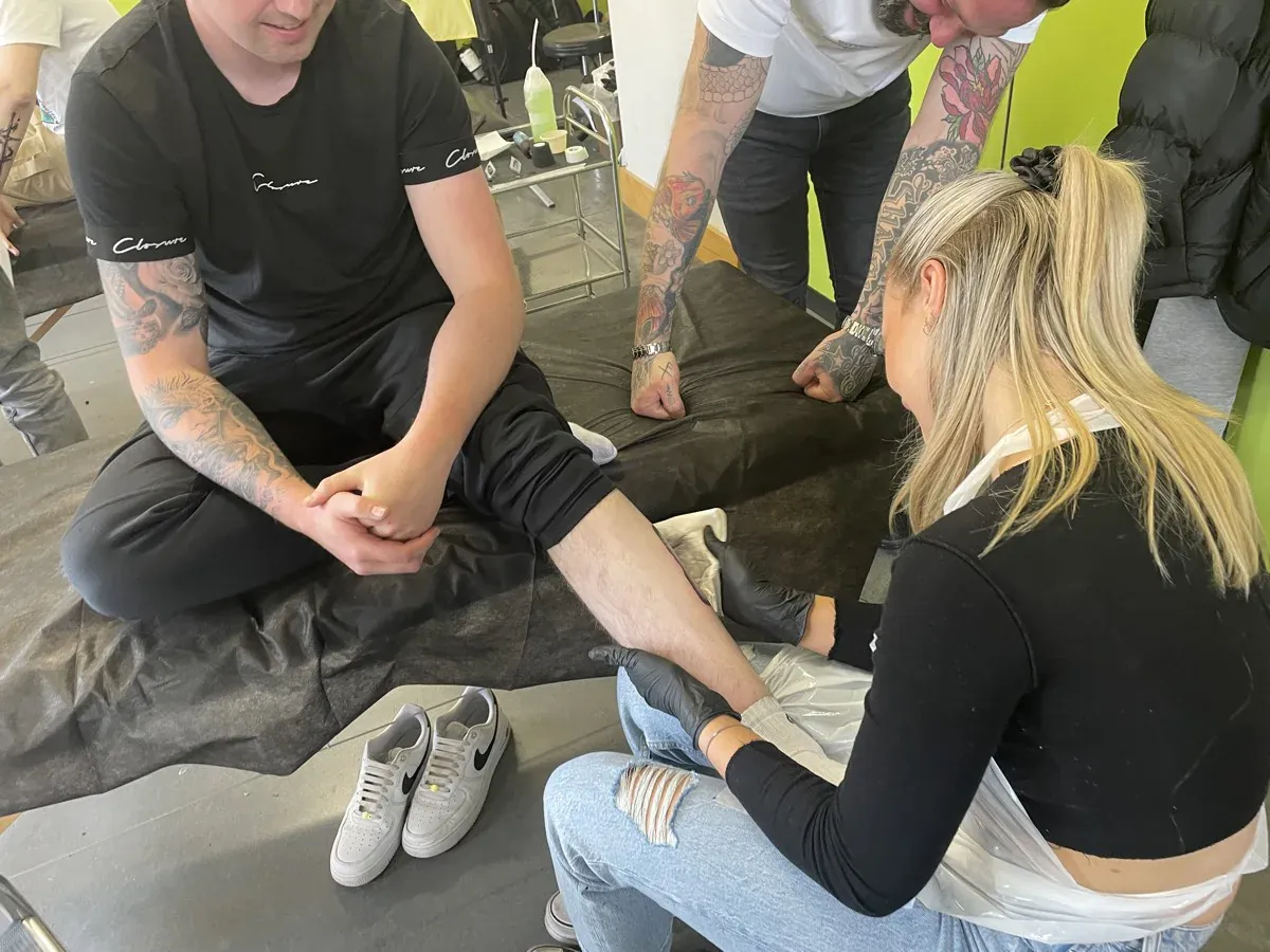 Complete beginners learning to tattoo at London Tattoo College